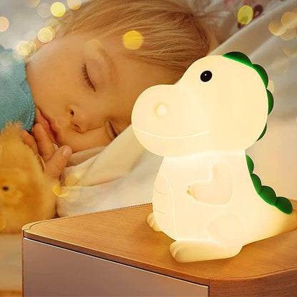 ENFANT ENDORMI AVEC VEILLEUSE DINOSAURE JAUNE 