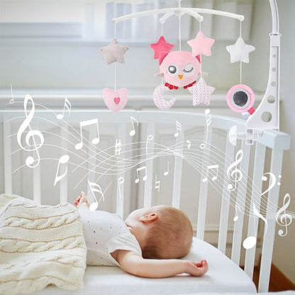 Bébé dort avec beau mobile musical hibou rose