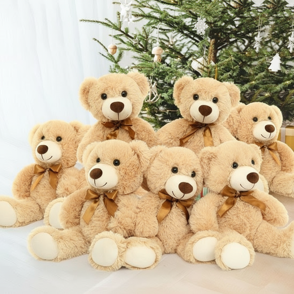 Famille d'ours en peluche près du sapin de Noël