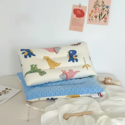 Oreiller enfant motifs dinosaures colorés