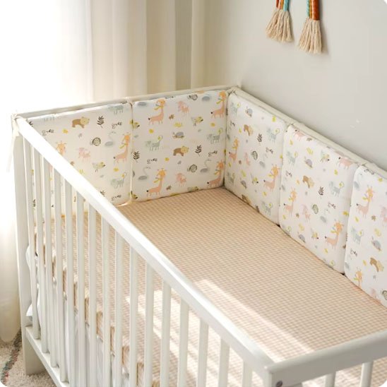 Tour de lit bébé avec motif animaux 