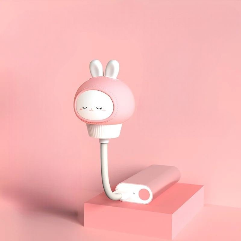 Veilleuse bébé rose avec cube pour charger 